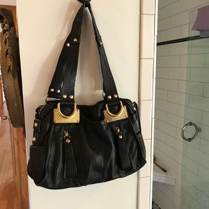B. Makowsky black leather bag purse.